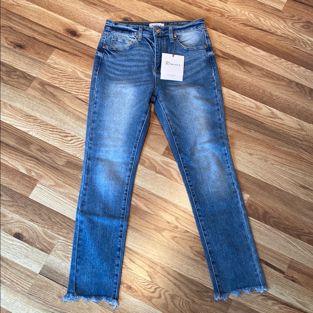Blue Skinny Jeans with Frayed Hem and Faded Look